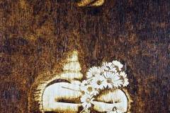 "Girl with Daisies"  Pyrography on wood